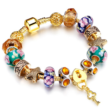 BRANSOLETKA złota charms STAL SZLACHETNA POZŁACANA